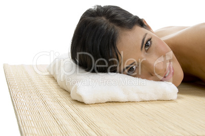 laying woman looking to camera