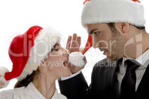 happy couple with red santa cap