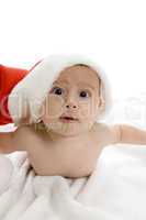 cute baby lying with santa cap