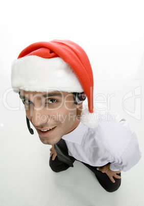 businessman with headphone and santa cap