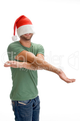 male hiding his face with santa cap