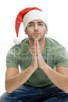 praying man with santa cap