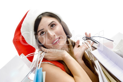 lady with bags and looking upward lady with bags and looking upward