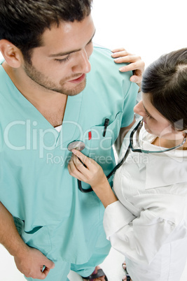 nurse examining the patient with stethoscope