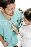 nurse examining the patient with stethoscope
