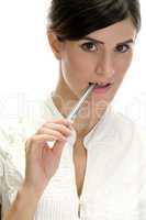 lady with pen in her mouth