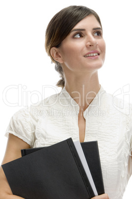 lady looking upward with files