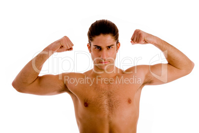 portrait of powerful man showing muscles