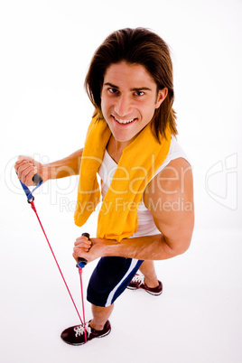 high angle view of man exercising with rope