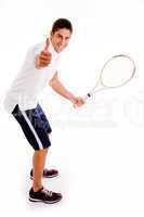side view of tennis player with thumbs up