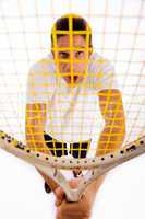 high angle view of shouting man holding racket