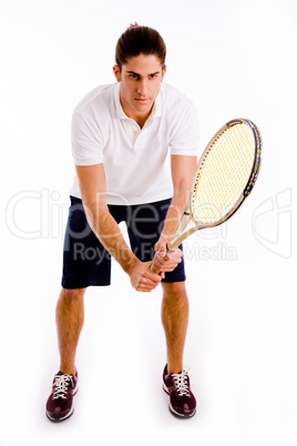 front view of player holding racket