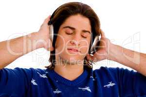 portrait of man listening music