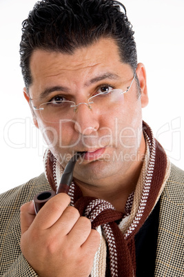 close up of doctor smoking pipe