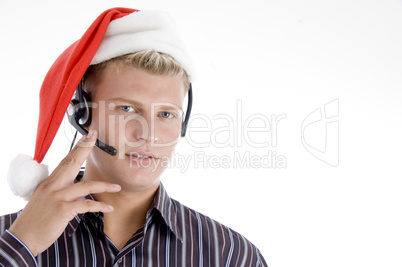 american man wearing headphone and santa hat