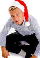 sitting male with christmas hat