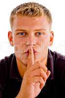 man instructing you to keep silent