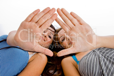 girls showing hands to camera
