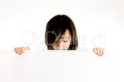 young girl holding placard