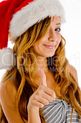 teen girl showing goodluck sign