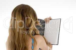 girl reading note book