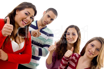 portrait of smiling people with thumbs up