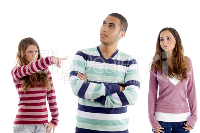 teens girl pointing towers boy and guy looking sideways