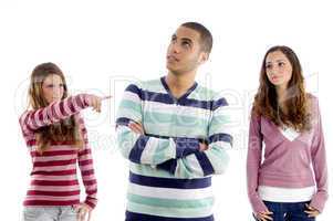 teens girl pointing towers boy and guy looking sideways