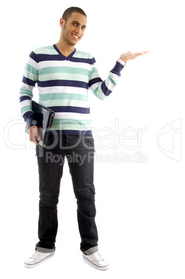 college boy holding laptop and showing hand gesture