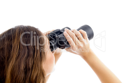 female watching through binocular