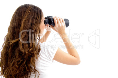 teenager girl watching through binocular