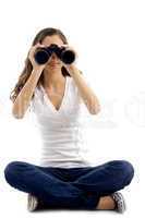 model looking through binocular