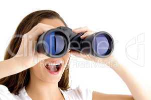 close up of female watching through binocular