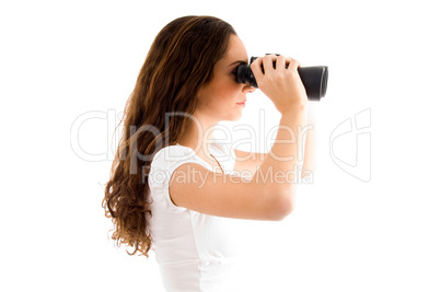 side pose of female holding binocular