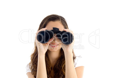 smiling female watching through binocular