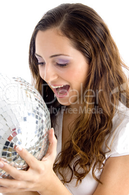 happy female holding disco ball