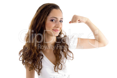 attractive female showing muscles