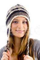 portrait of attractive female wearing woolen cap