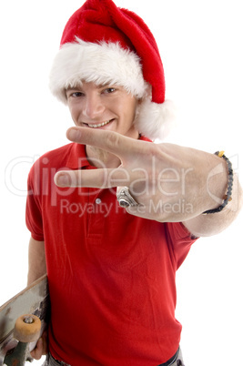 smiling male showing victory sign