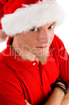 male wearing christmas hat looking at camera