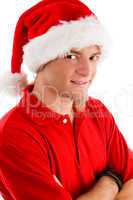 smiling man wearing christmas hat