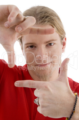male showing framing hand gesture