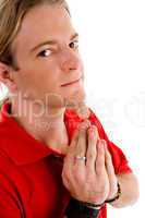 male looking at camera while praying