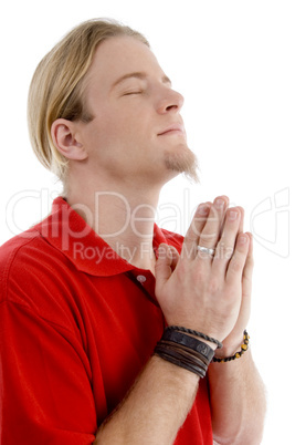 smart young male praying to god
