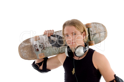 handsome man holding skateboard