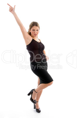 beautiful young woman pointing upwards