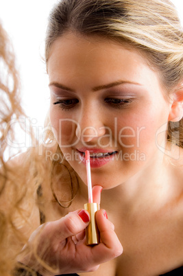 pretty model getting lip makeup