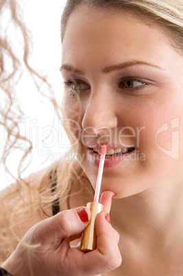 pretty model getting lip makeup