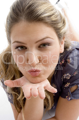 woman showing kissing gesture