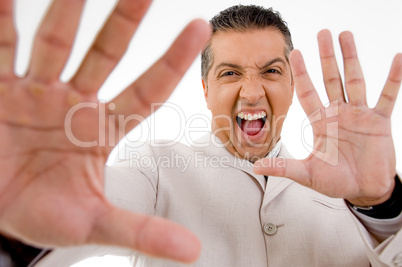 portrait of happy businessman showing palms